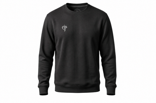 Disciple Sweater in Black — front, embroidered Cedar and Psalm badge